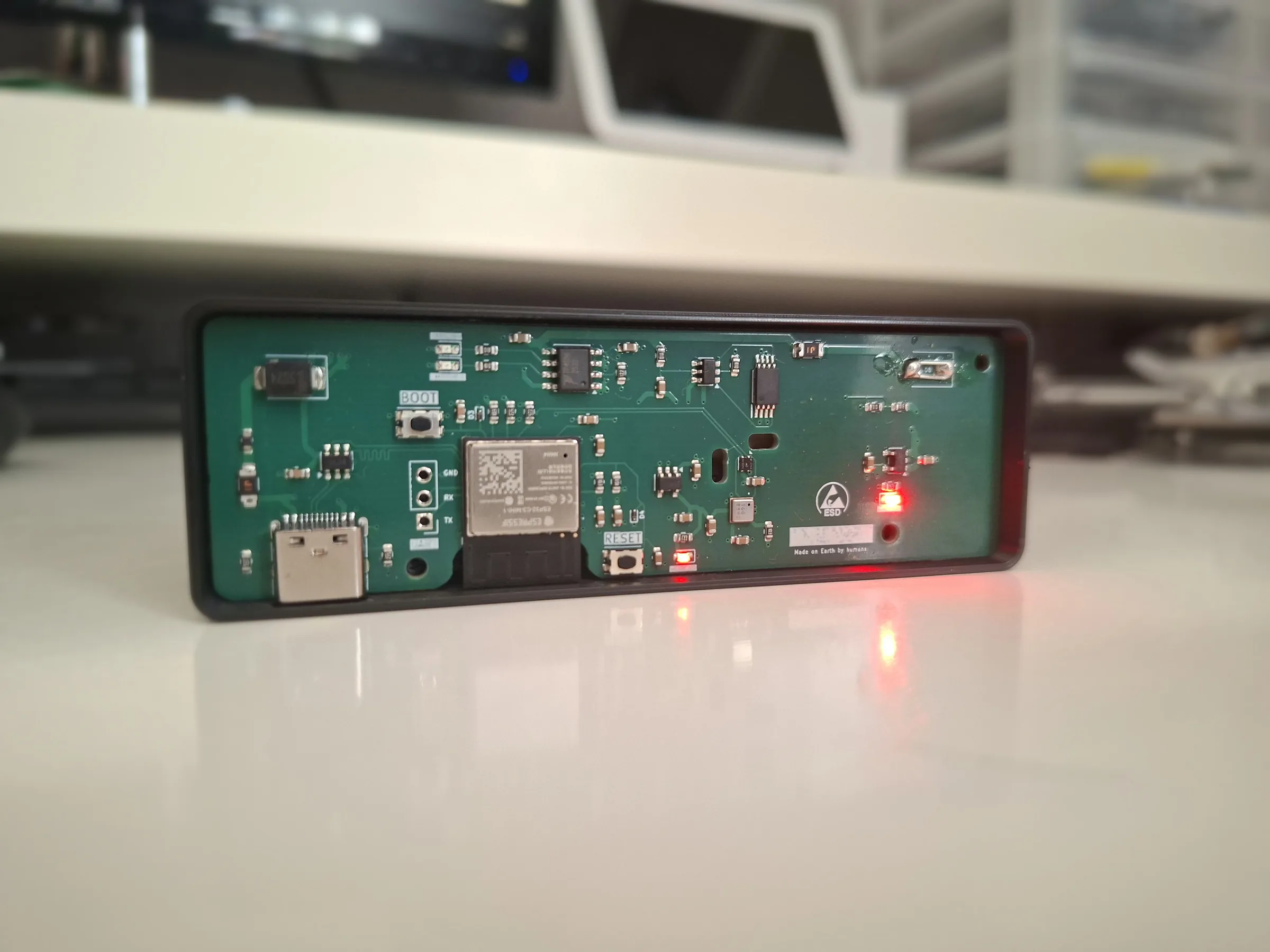 Air quality PCB in a 3D printed case, power LED on